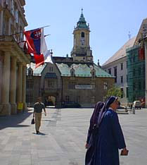 Nuns in the city square
